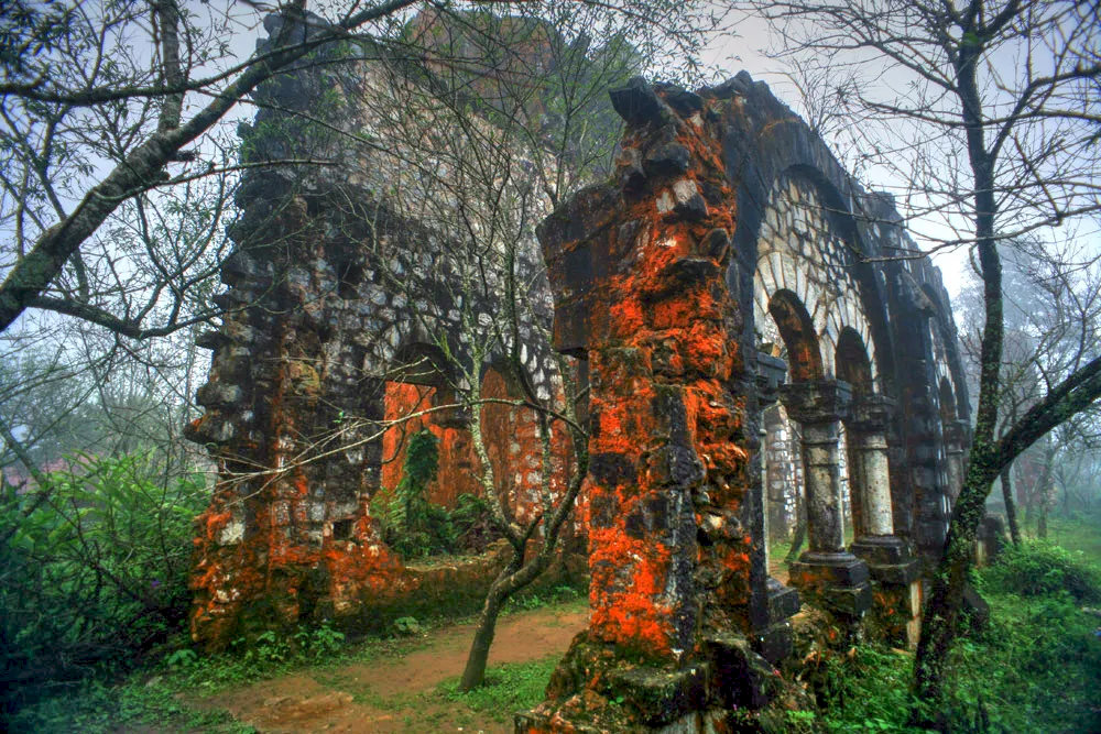 the ruins of the Ta Phin Monastery offer a hauntingly beautiful glimpse into the region’s colonial past